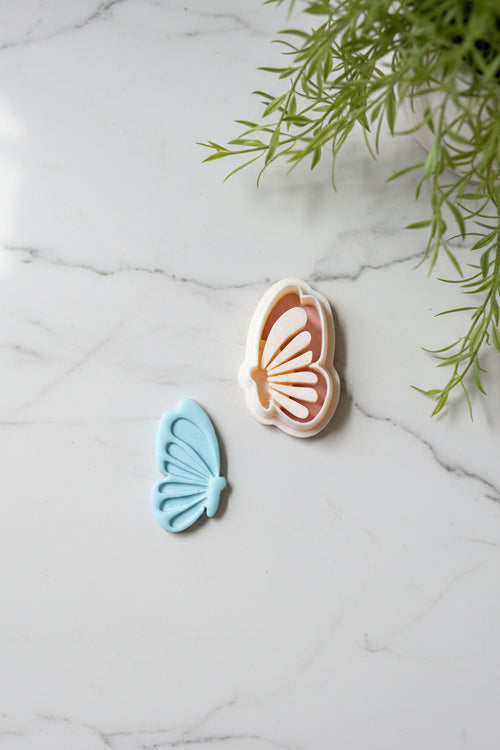 Petal & Posy butterfly embossing polymer clay cutter set with detailed butterfly shapes for crafting and jewelry making.