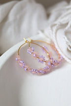 Lilac beaded hoop earrings with daisy chain design by Petal & Posy, featuring delicate hand-beaded floral details.