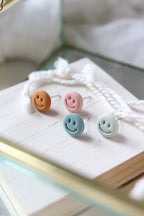 Don't Worry, Be Happy Studs
