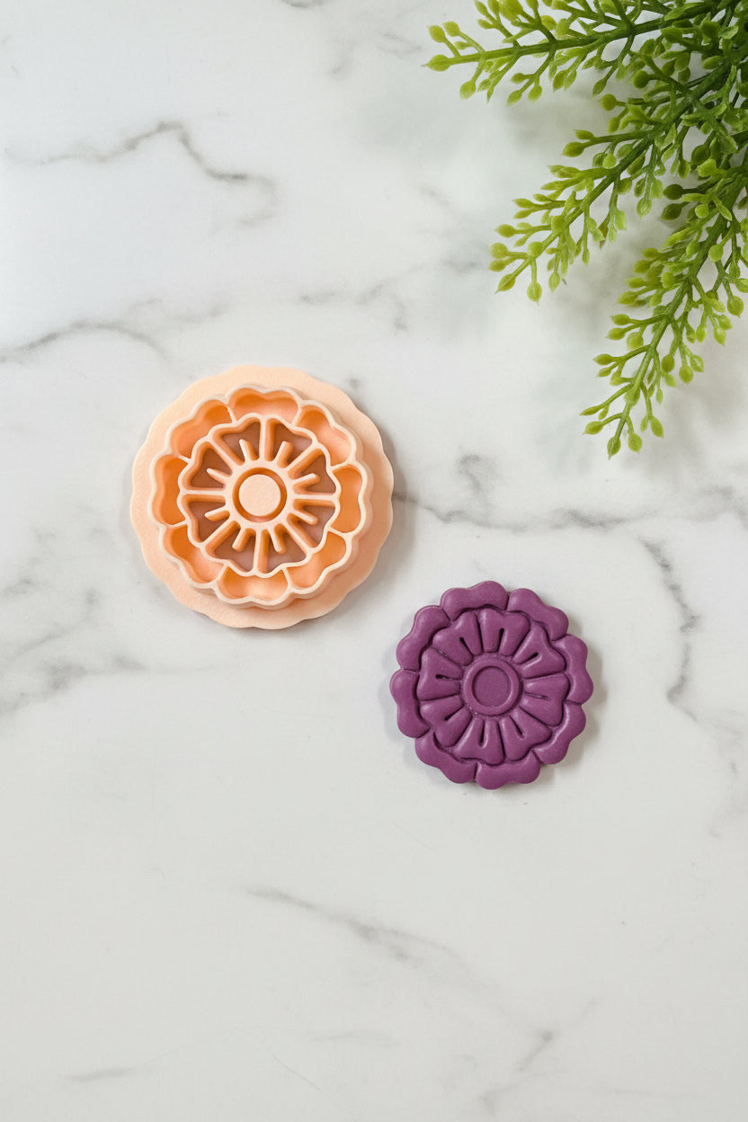 Gerbera Daisy polymer clay cutter by Petal & Posy, showing a detailed flower-shaped cutting tool for crafting and DIY projects.