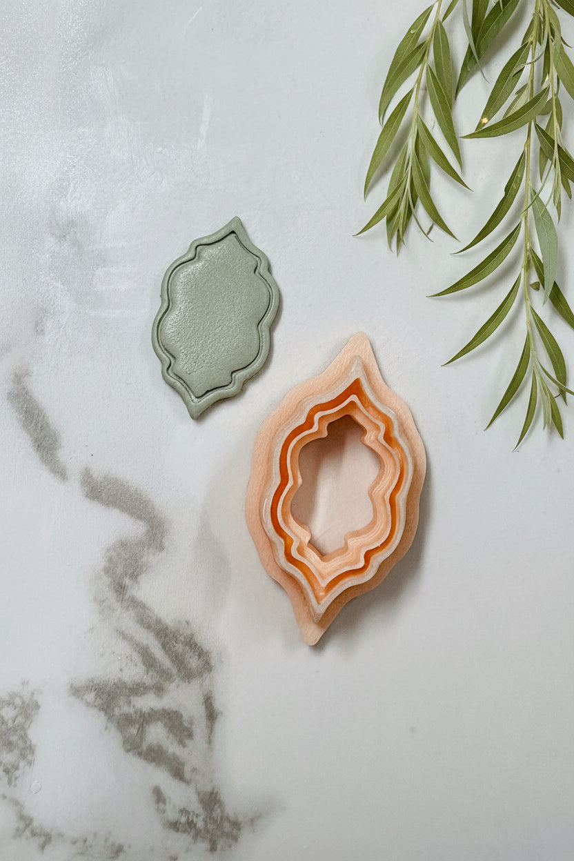 Petal & Posy Petite Ornate Frame Polymer Clay Cutter with intricate design for detailed craft projects.