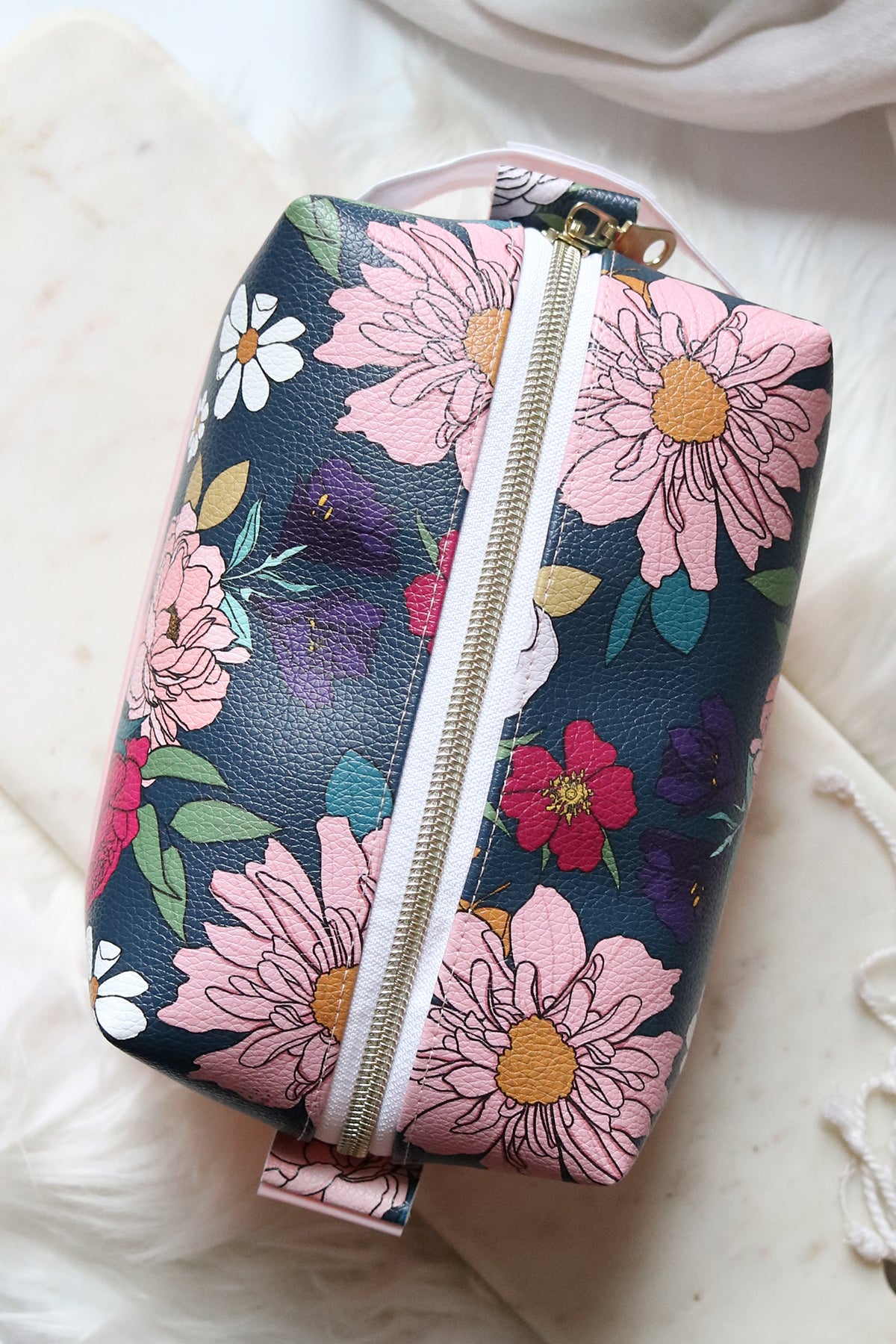 The Posy Pouch Vinyl Makeup Bag in First Bloom