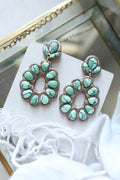 Sagebrush Southwestern turquoise polymer clay dangle stud earrings by Petal & Posy, featuring vibrant blue and earthy tones.