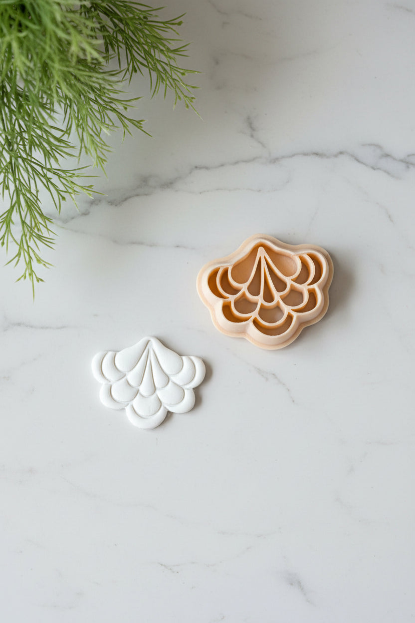 Petal & Posy scalloped plume polymer clay earring cutter with scalloped edges for jewelry making and design.