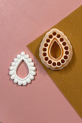 Petal & Posy scalloped teardrop polymer clay earring cutter showing detailed scalloped edge and teardrop shape.