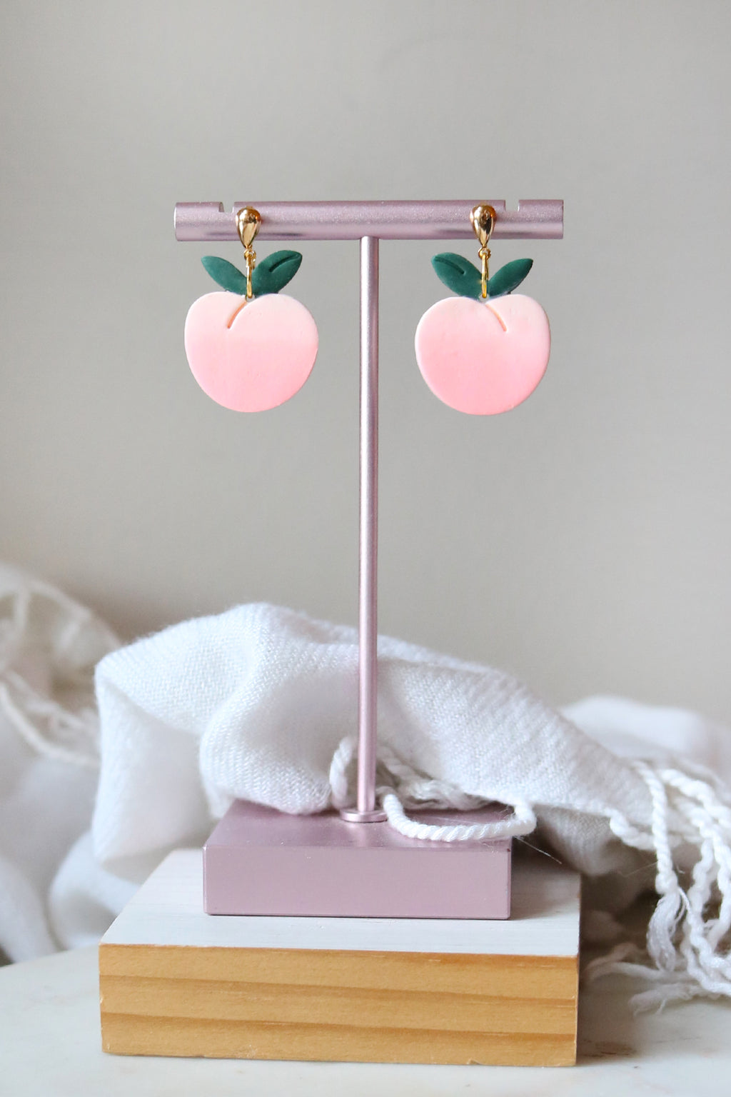 Petal & Posy Sweet Peach Dangle Stud Earrings with peach-colored gemstone accents on gold-tone studs