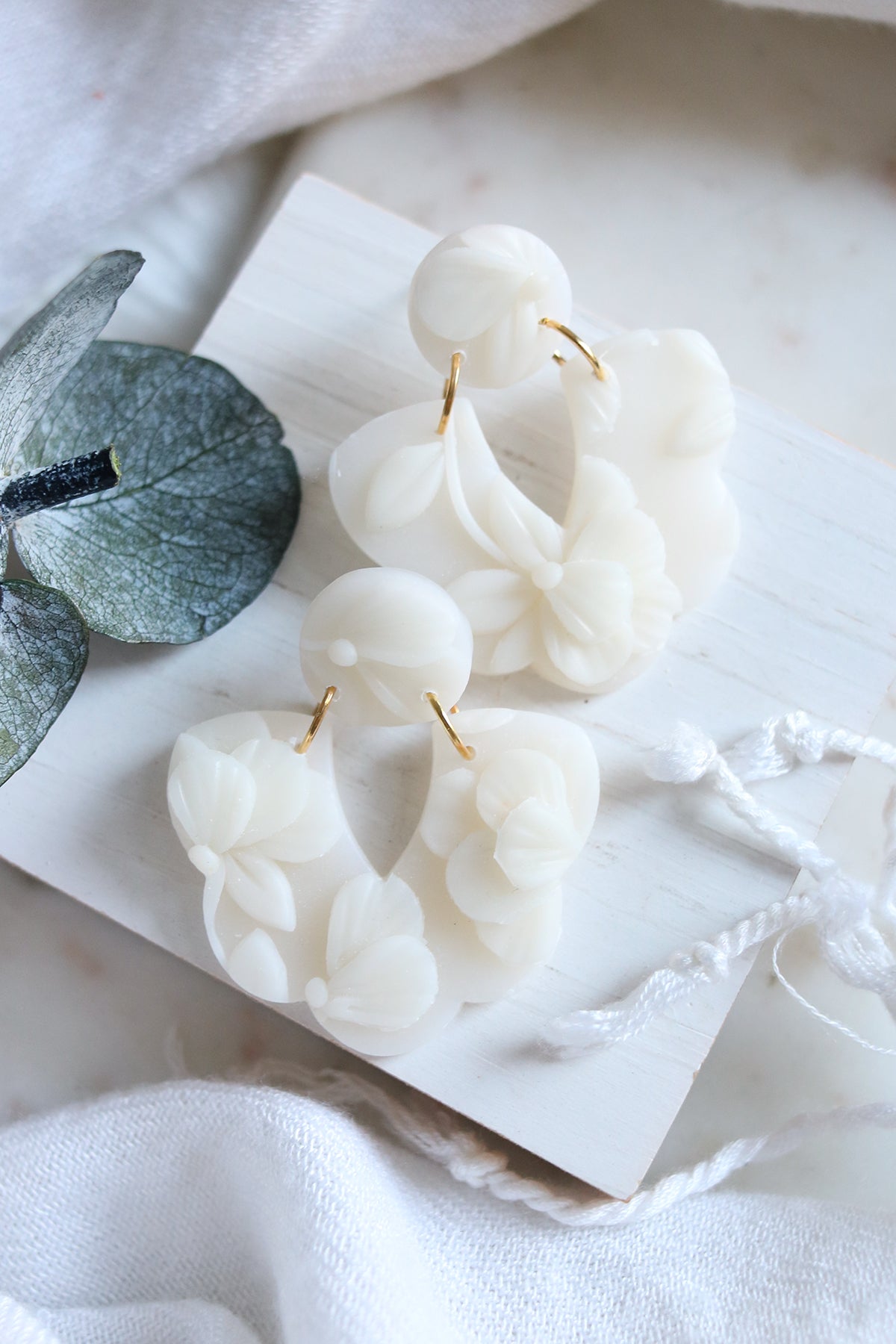 Petal & Posy Magnolia Dangle Stud Earrings featuring elegant calla lily design with delicate floral details.